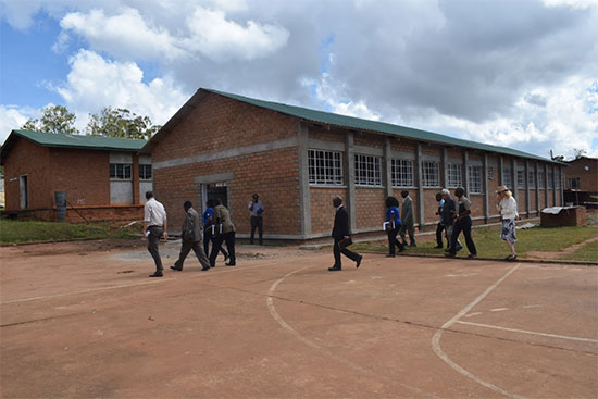 A visiting team appreciating progress of a building under construction (R) with classroom and laboratory divisions for Renewable Energy Trade at MTC A visiting team appreciating progress of a building under construction (R) with classroom and laboratory divisions for Renewable Energy Trade at MTC